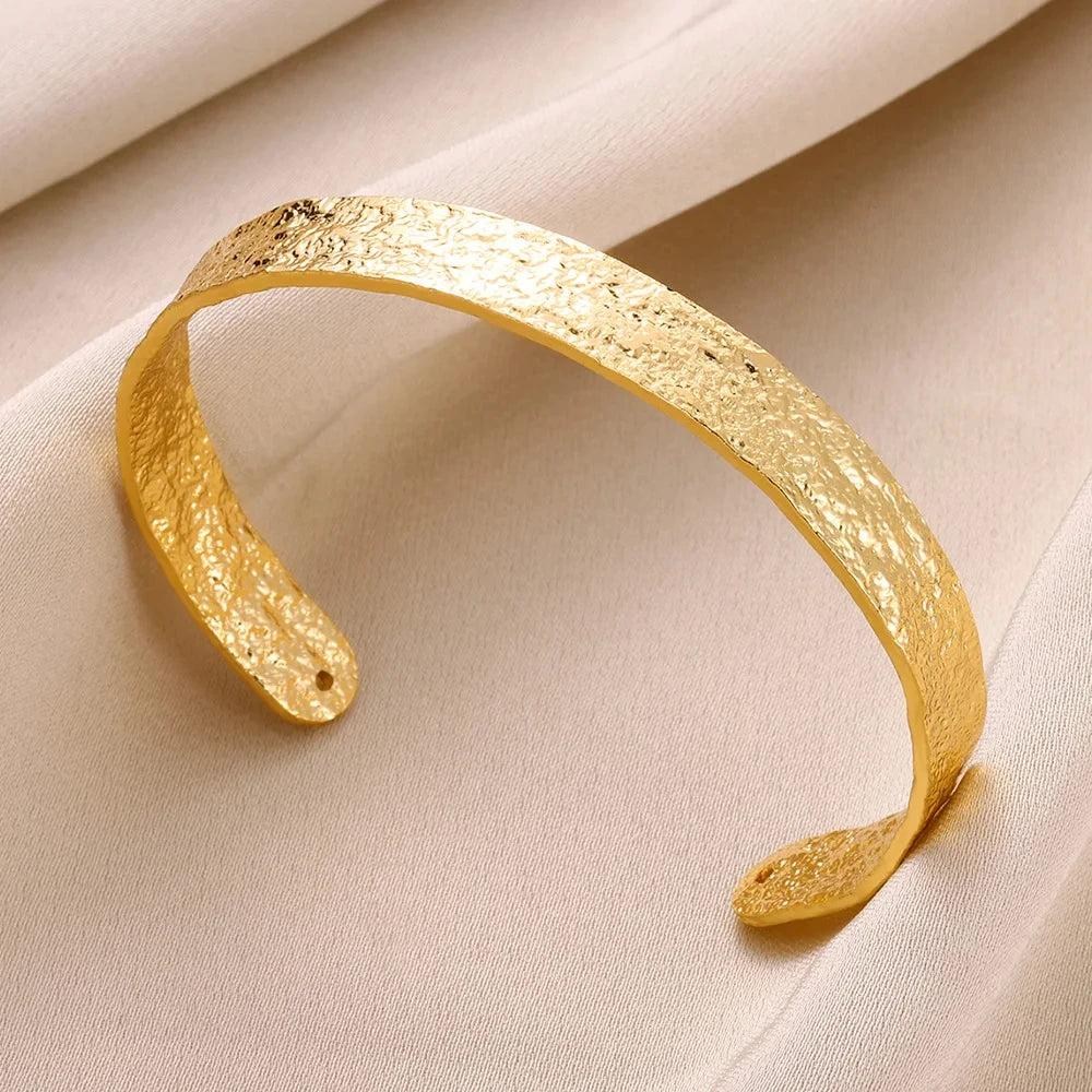 Manchette dorée à motifs, en acier inoxydable vue 22 - Chandore